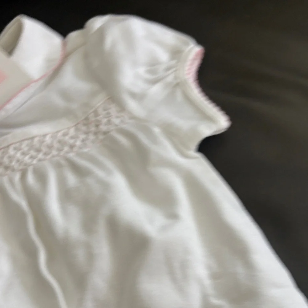 Janie and Jack White Smocked Cotton One-Piece with Pink Trim